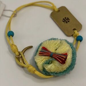 Authentic TORY BURCH Logo Charm Thread Bracelet.  Style# 11165820